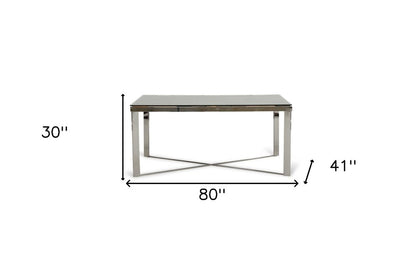 Mercer 80-inch glass dining table on a silver wood and stainless steel trestle base, additional view