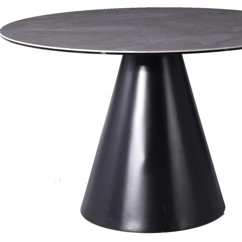 Sloane 47-inch round dining table with a grey stone top on an iron pedestal base, additional view