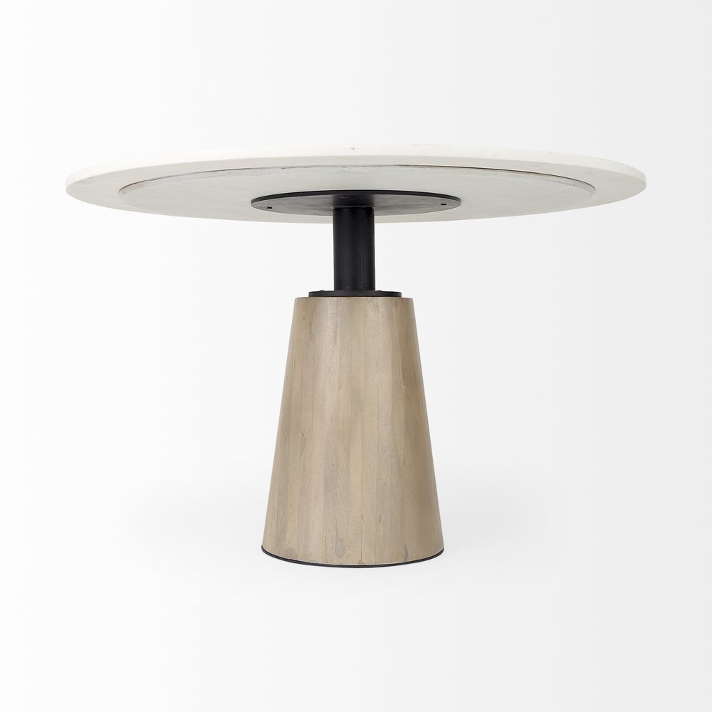 Marlow 48-inch round dining table with a white marble top on a tapered wood pedestal, additional view
