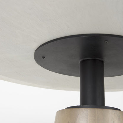 Marlow 48-inch round dining table with a white marble top on a tapered wood pedestal, additional view