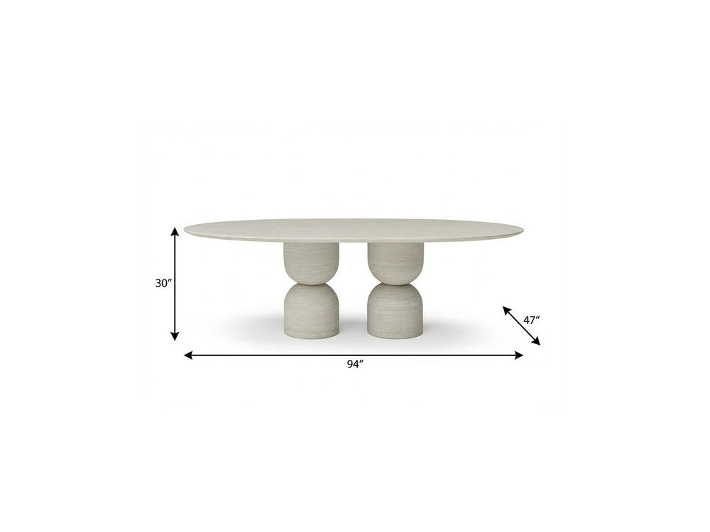 Sabine 94-inch oval dining table in beige marble on a double pedestal base, additional view