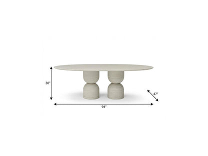 Sabine 94-inch oval dining table in beige marble on a double pedestal base, additional view
