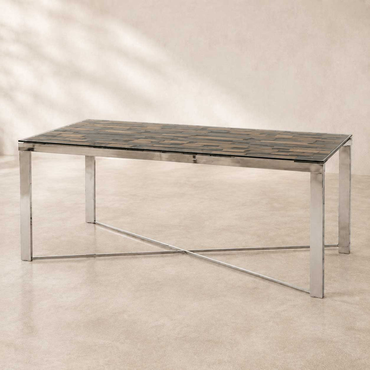 Mercer 80-inch glass dining table on a silver wood and stainless steel trestle base