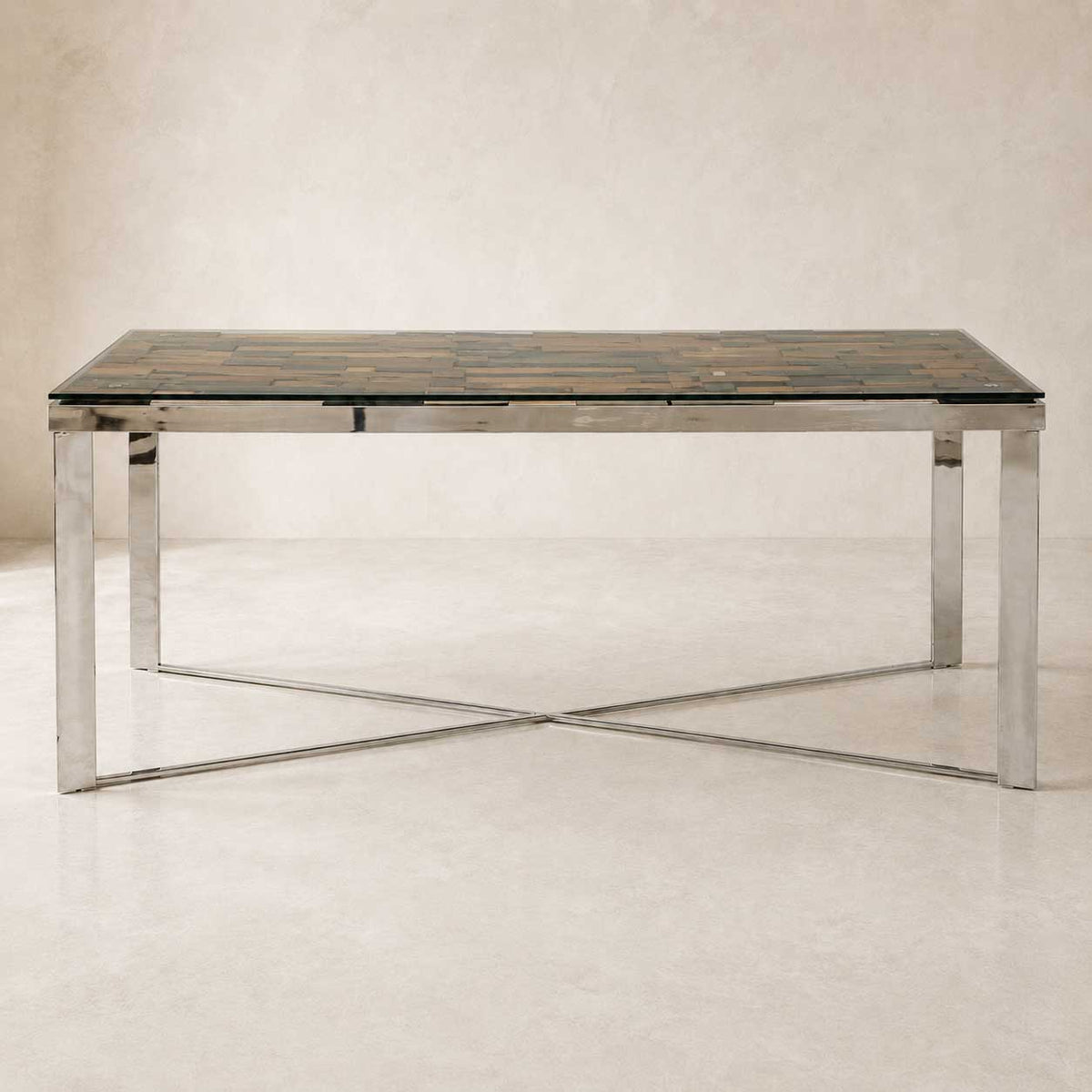 Mercer 80-inch glass dining table on a silver wood and stainless steel trestle base