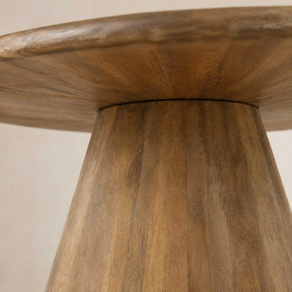 Rowan 60-inch round dining table in natural distressed solid wood on a pedestal base