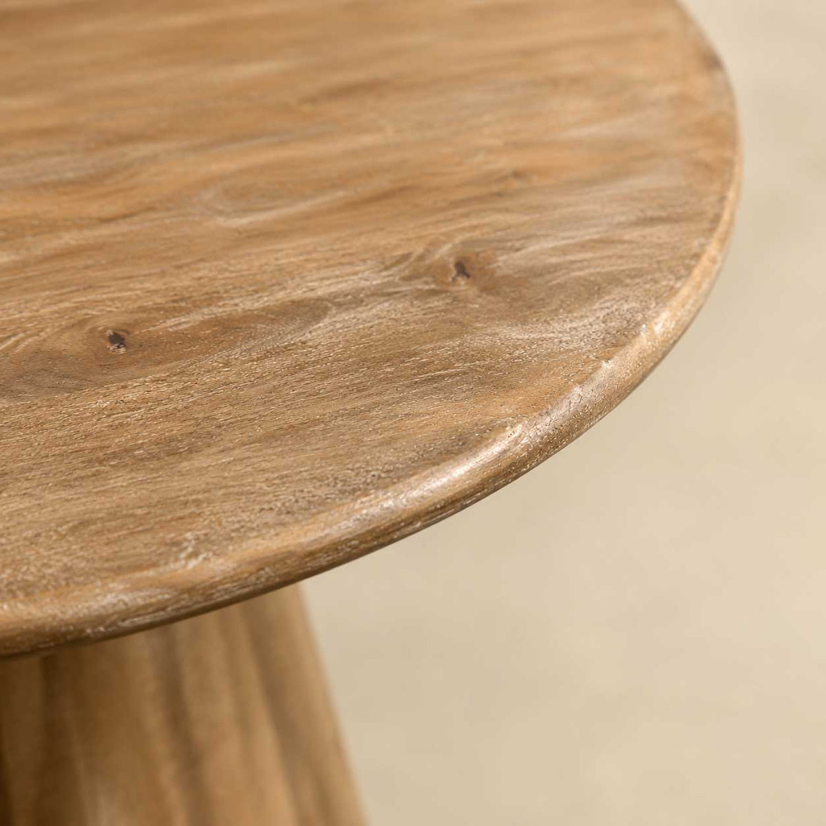 Rowan 60-inch round dining table in natural distressed solid wood on a pedestal base