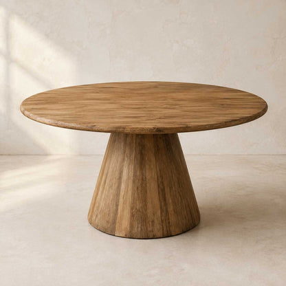 Rowan 60-inch round dining table in natural distressed solid wood on a pedestal base