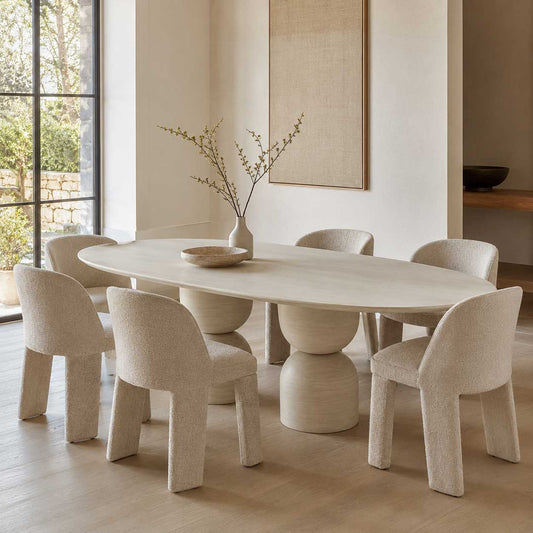 Sabine 94-inch oval dining table in beige marble on a double pedestal base